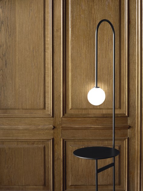 Light with a table by Living Divani